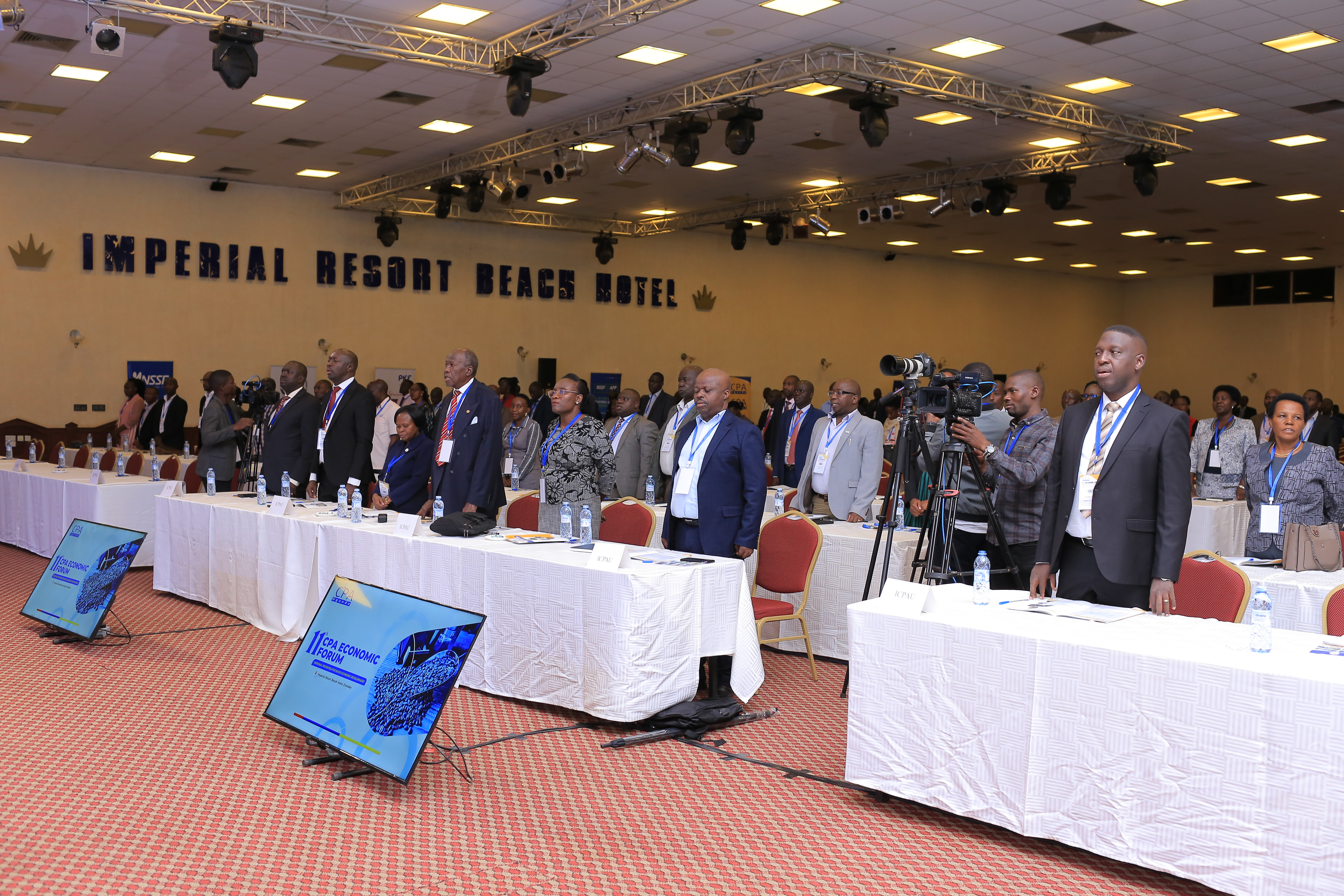 A cross section of participants at the 11th CPA Economic Forum singing the National and East African anthems