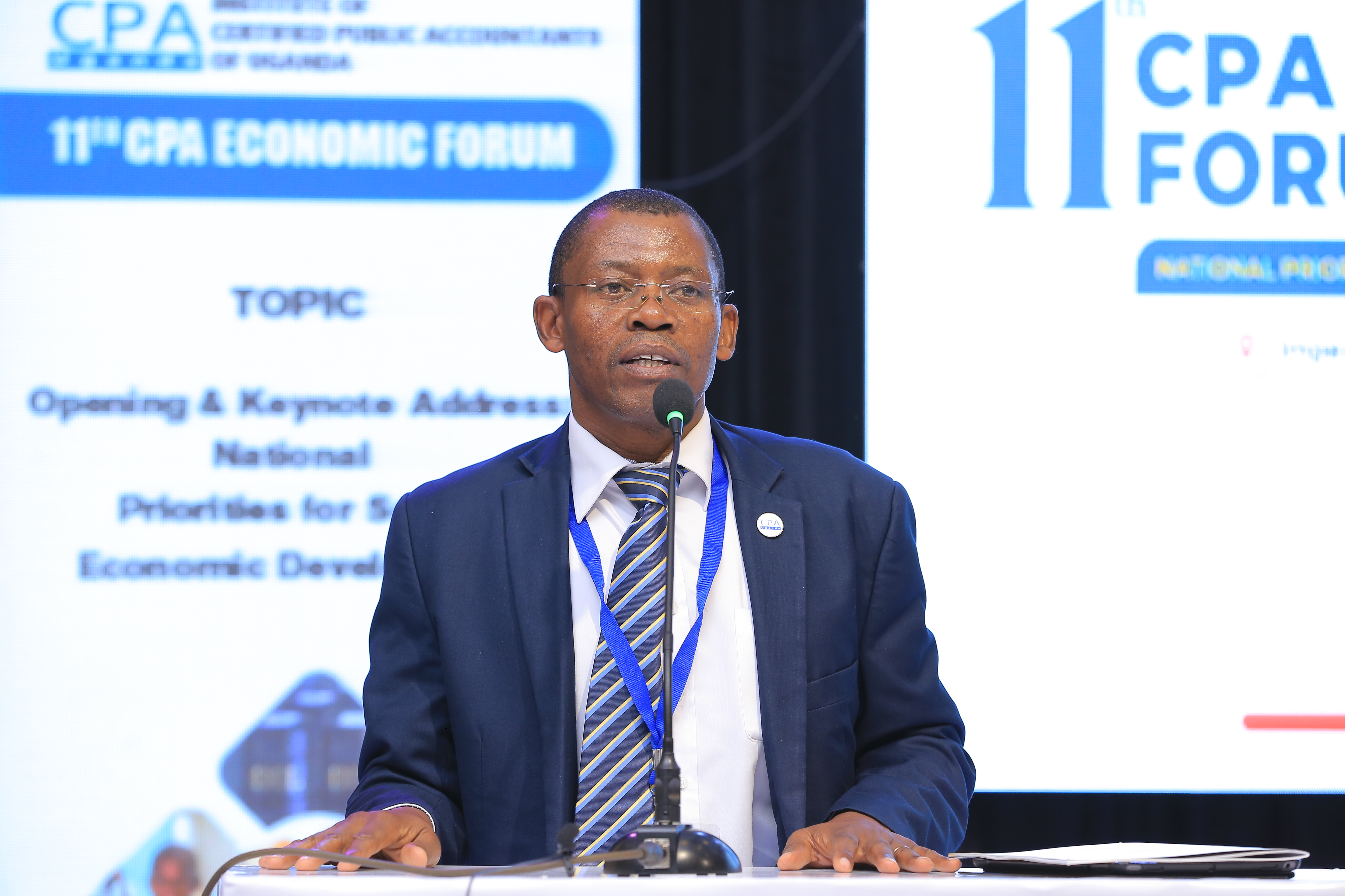 ICPAU Secretary CPA Derick Nkajja giving Welcome remarks at the 11th CPA Economic Forum