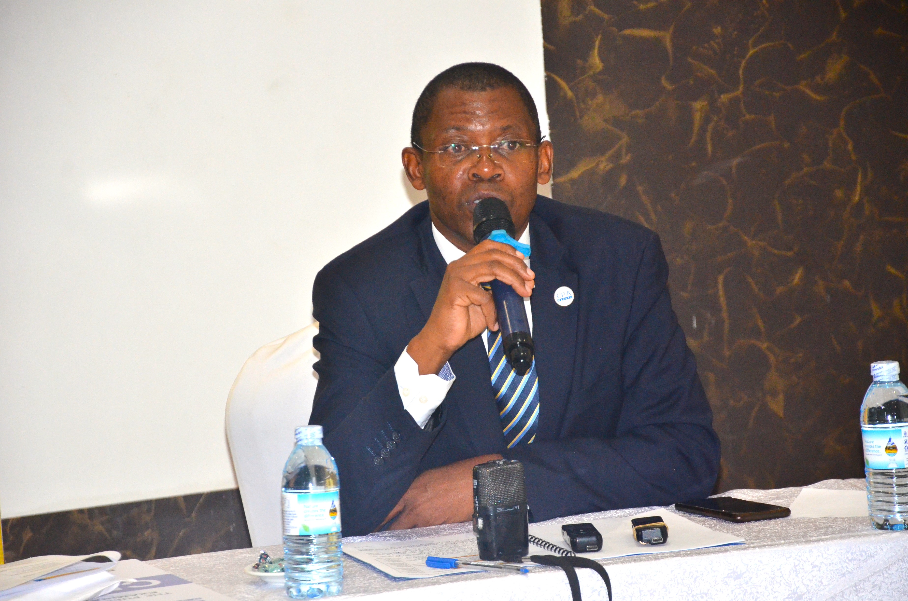 ICPAU Secretary. CEO CPA Derick Nkajja addressing the media at the release of the 2023 August examination results.