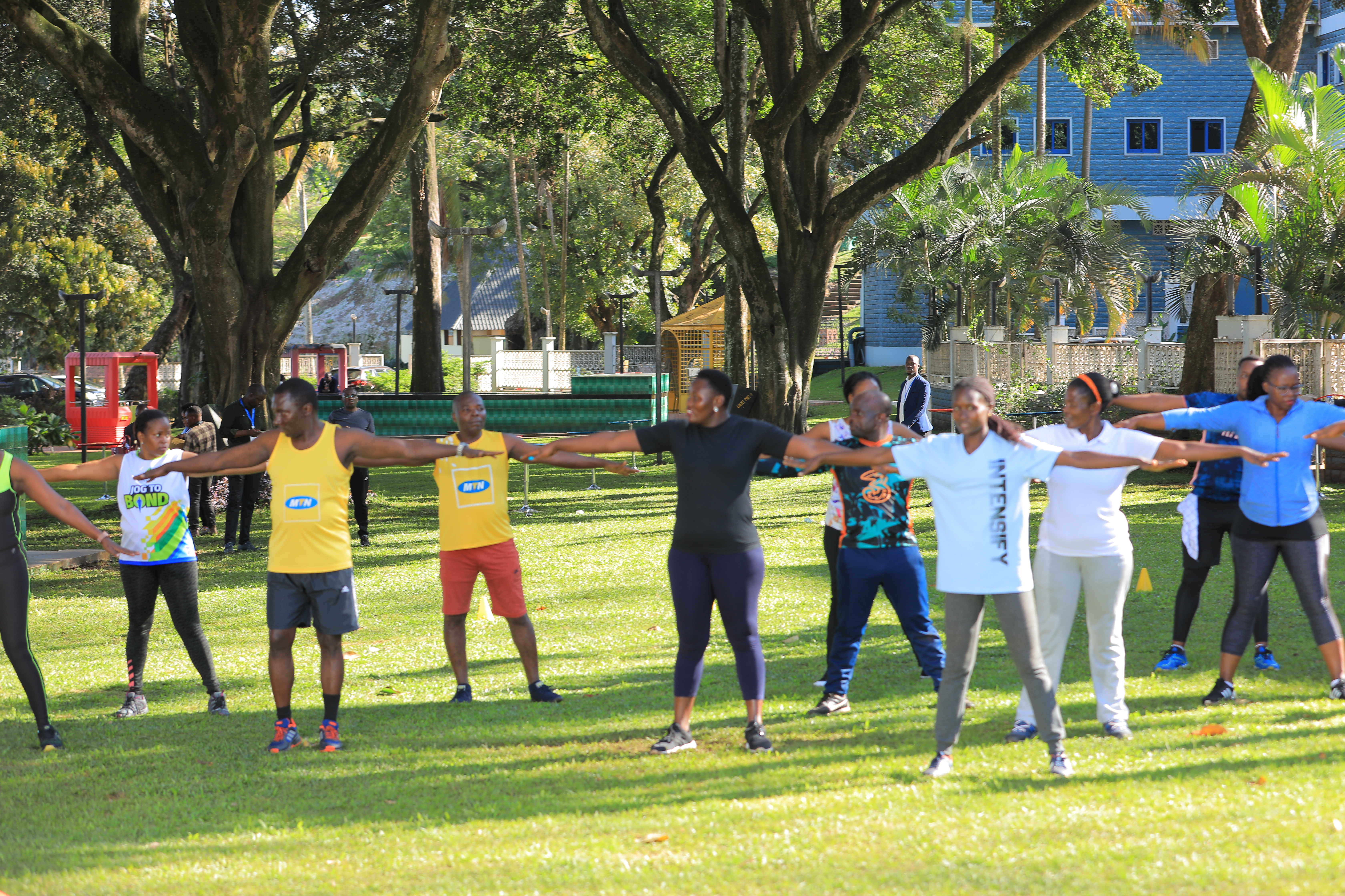 Participants embracing the burn during corporate exercises.