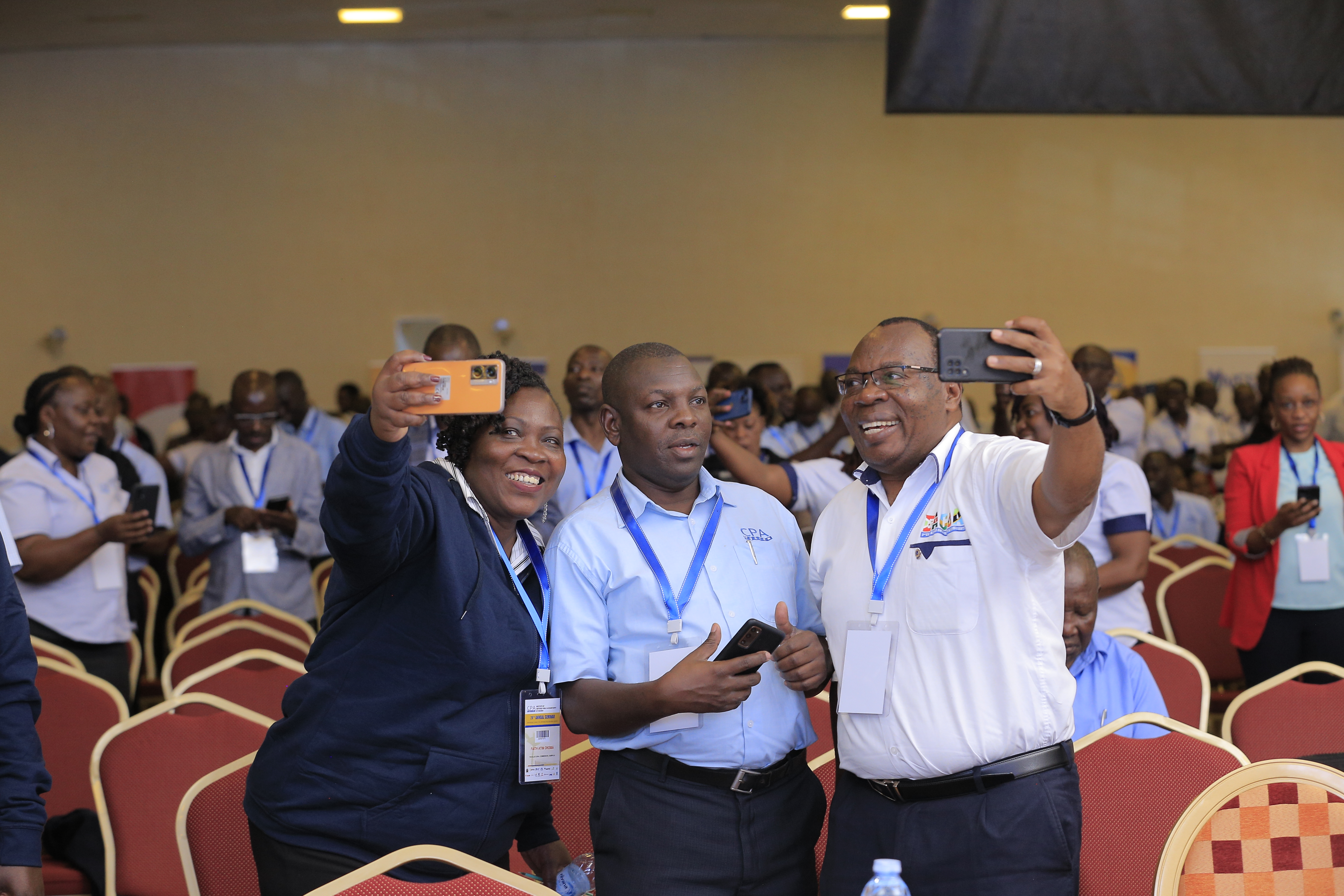 Selfie time at the Annual Seminar. Right is ICPAU Director of Education John Bosco Ntangaare.