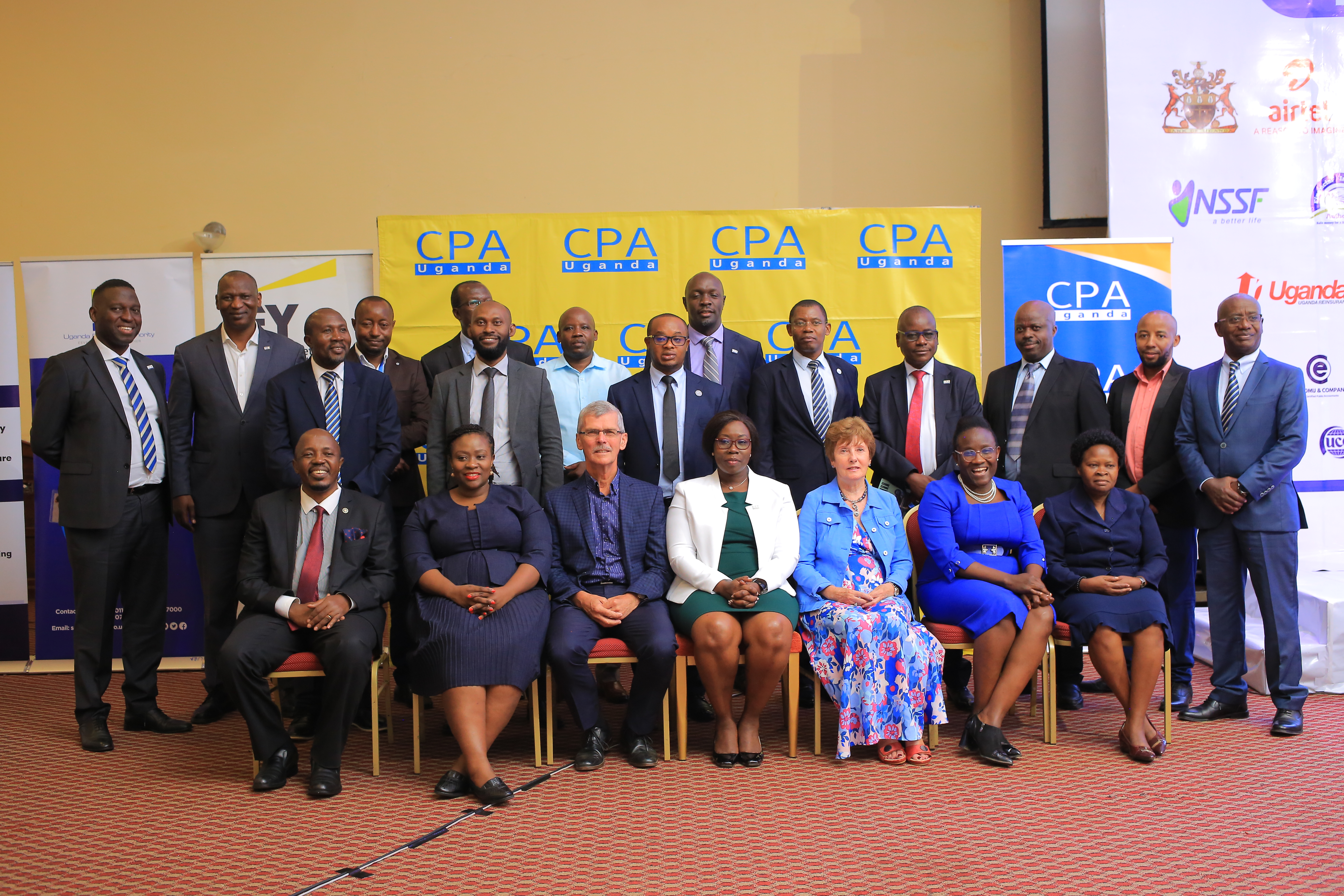Some delates from East Africa Community Institutes of Accountancy pose for a photo with the Keynote Speaker Dr Ian Clarke (3rd left) ICPAU President CPA Josephine Okui Ossiya