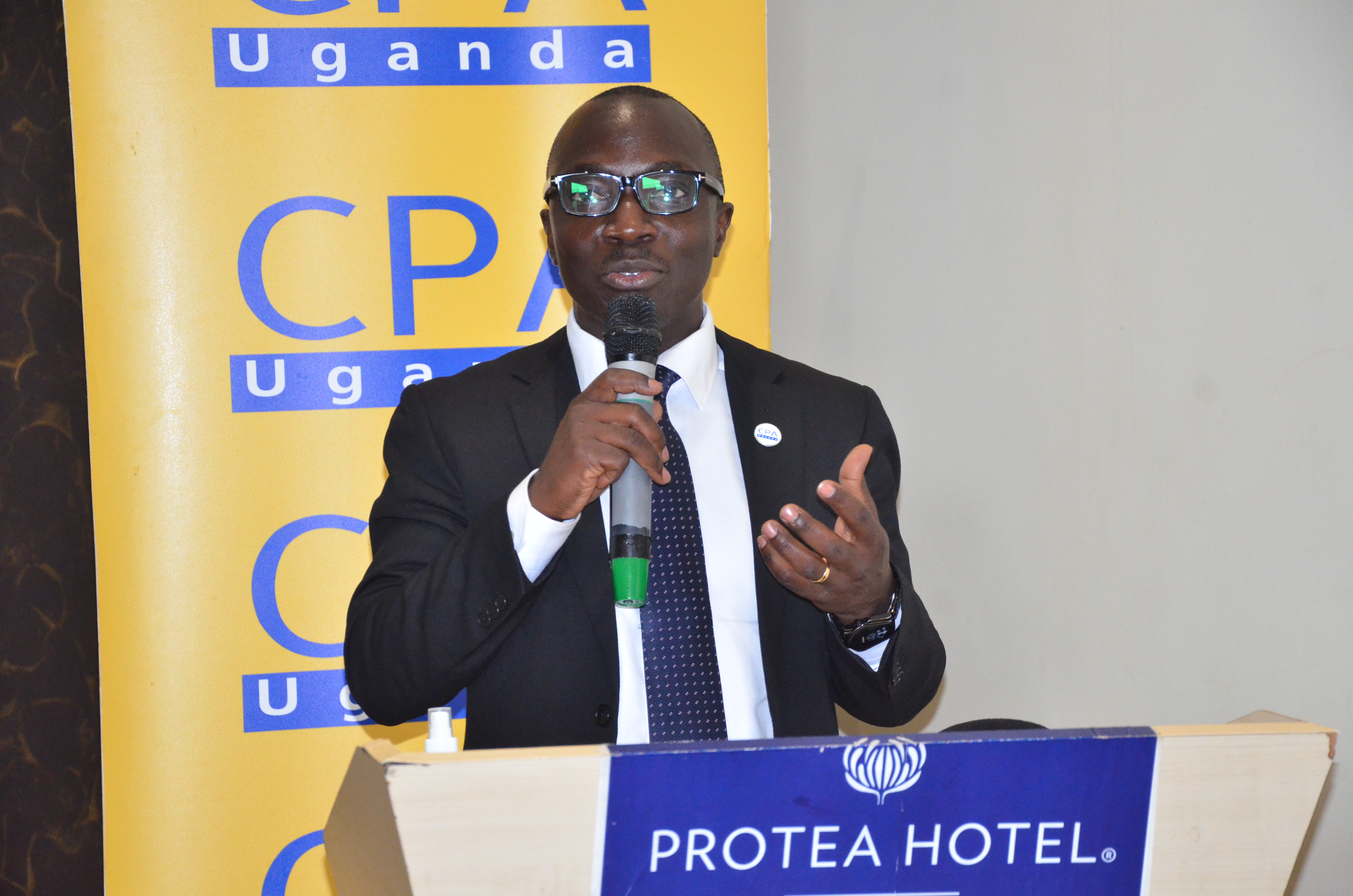 CPA Charles Lutimba, the Director Standards ICPAU addresses journalists at the FiRe Awards press briefing held at Protea Hotel, Skyz, Naguru