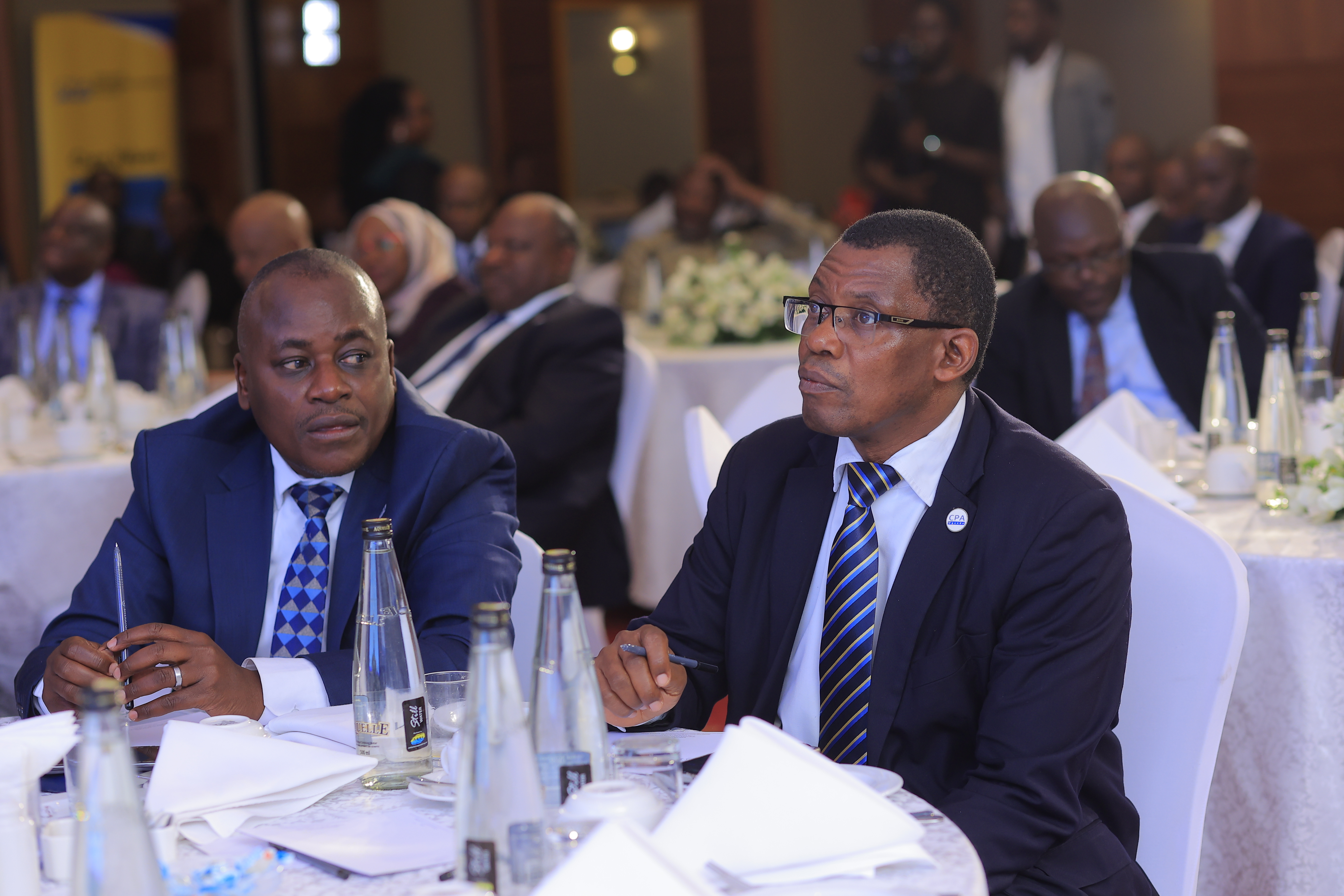 CPA Ronald Mutumba - Vice President, ICPAU Council with CPA Derick Nkajja - Secretary ICPAU, attending the 3rd C-Suite Forum at Sheraton Hotel in Kampala.