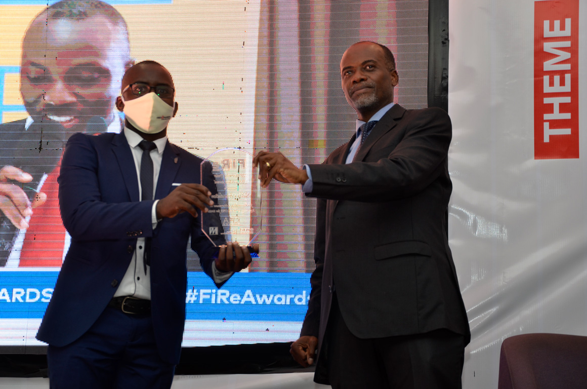 Child's i Foundation won the Award for Reporting under the IFRS for SMEs category. Left is CPA Patrick Kabenge the Finance Manager & Right is Keith Kalyegira, CEO of CMA
