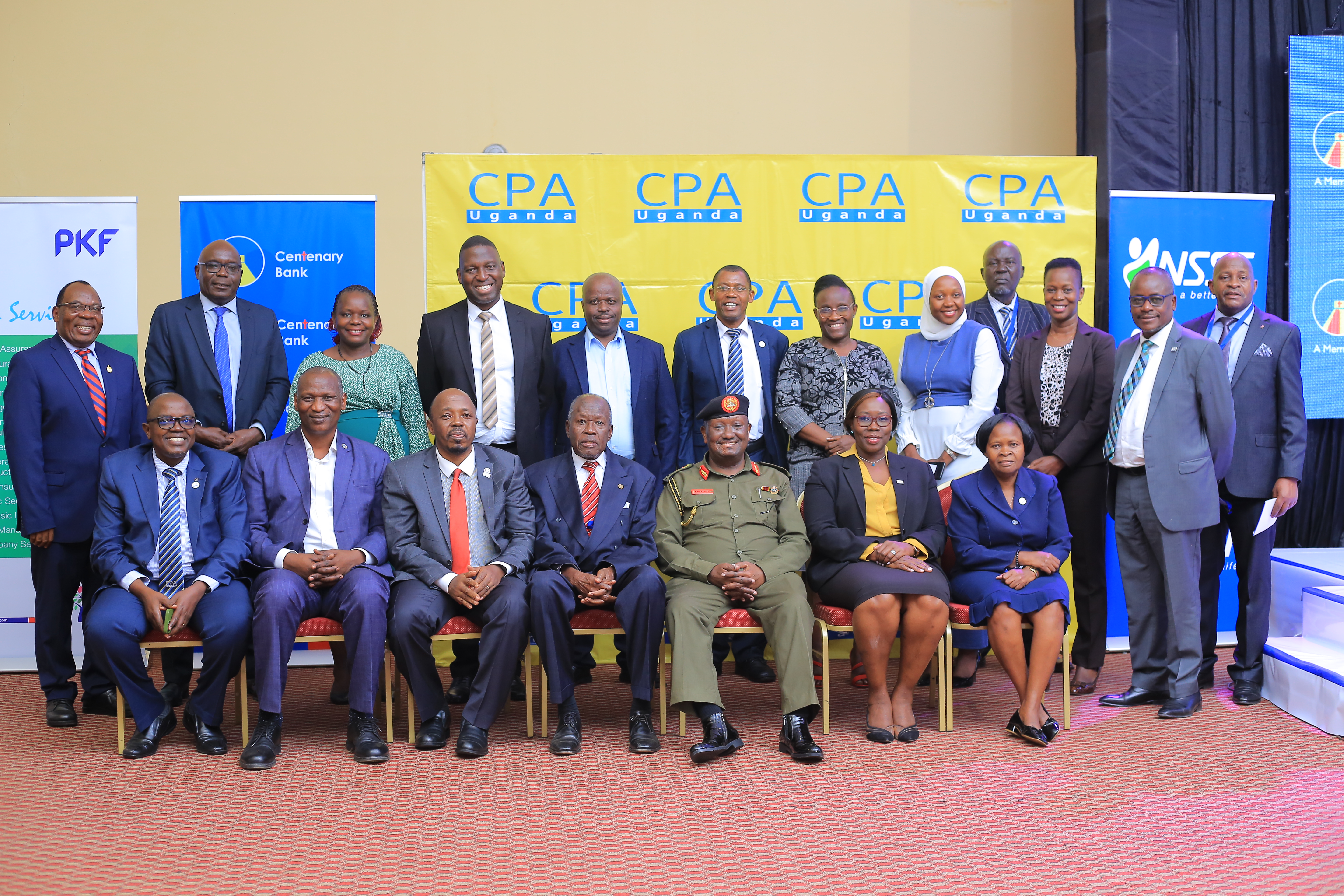 ICPAU President CPA Josephine Okui Ossiya (Seated-2nd right), Brig. Gen. Felix Kulayigye (Seated 3rd right) posing for photograph with some Council members and ICPAU Past Presidents.