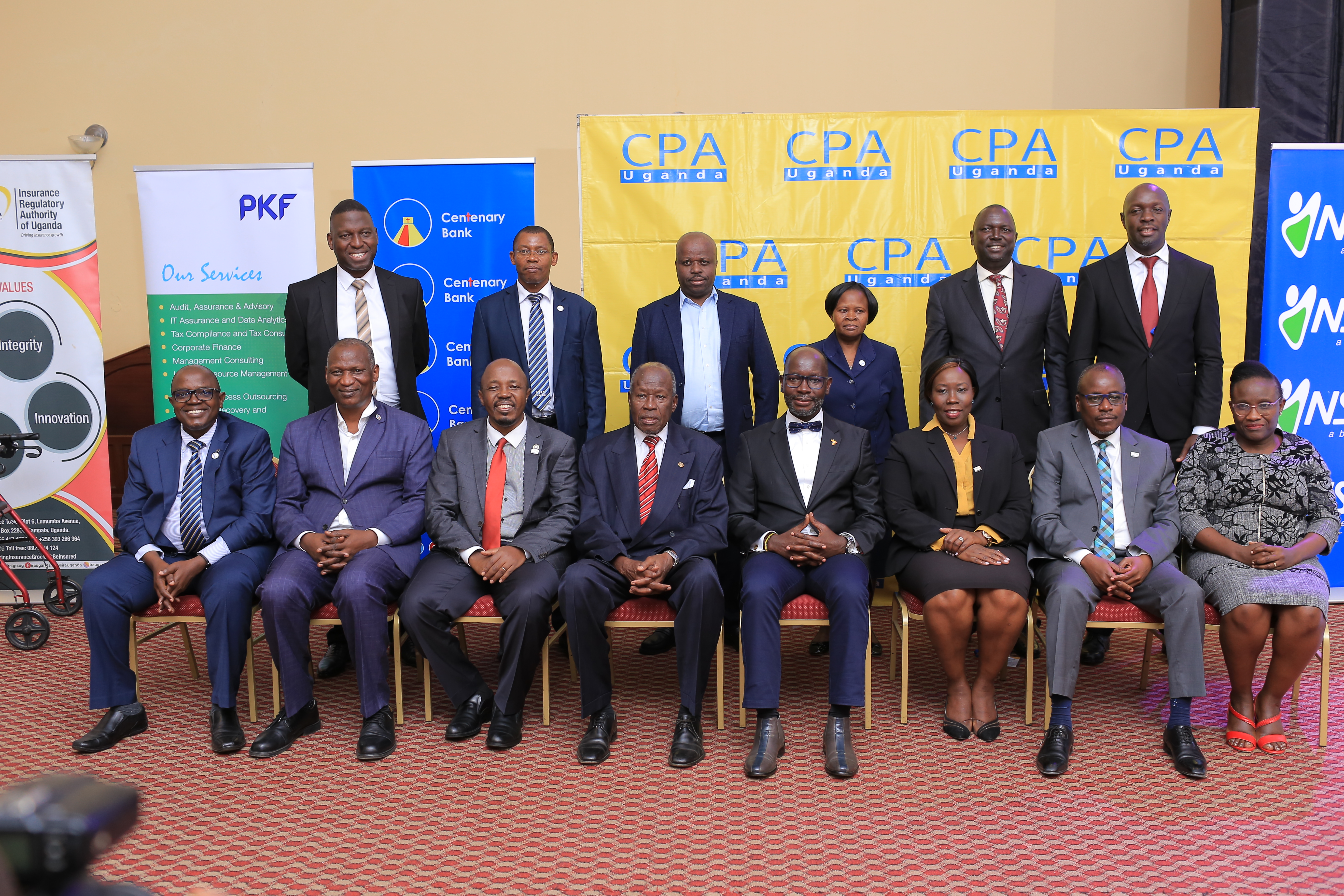 ICPAU President CPA Josephine Okui Ossiya(Seated; 3rd right), Keynote Address Speaker Hon.Denis Hamson Obua(Seated; 4th right) posing for a photograph with ICPAU past presidents & council m'brs