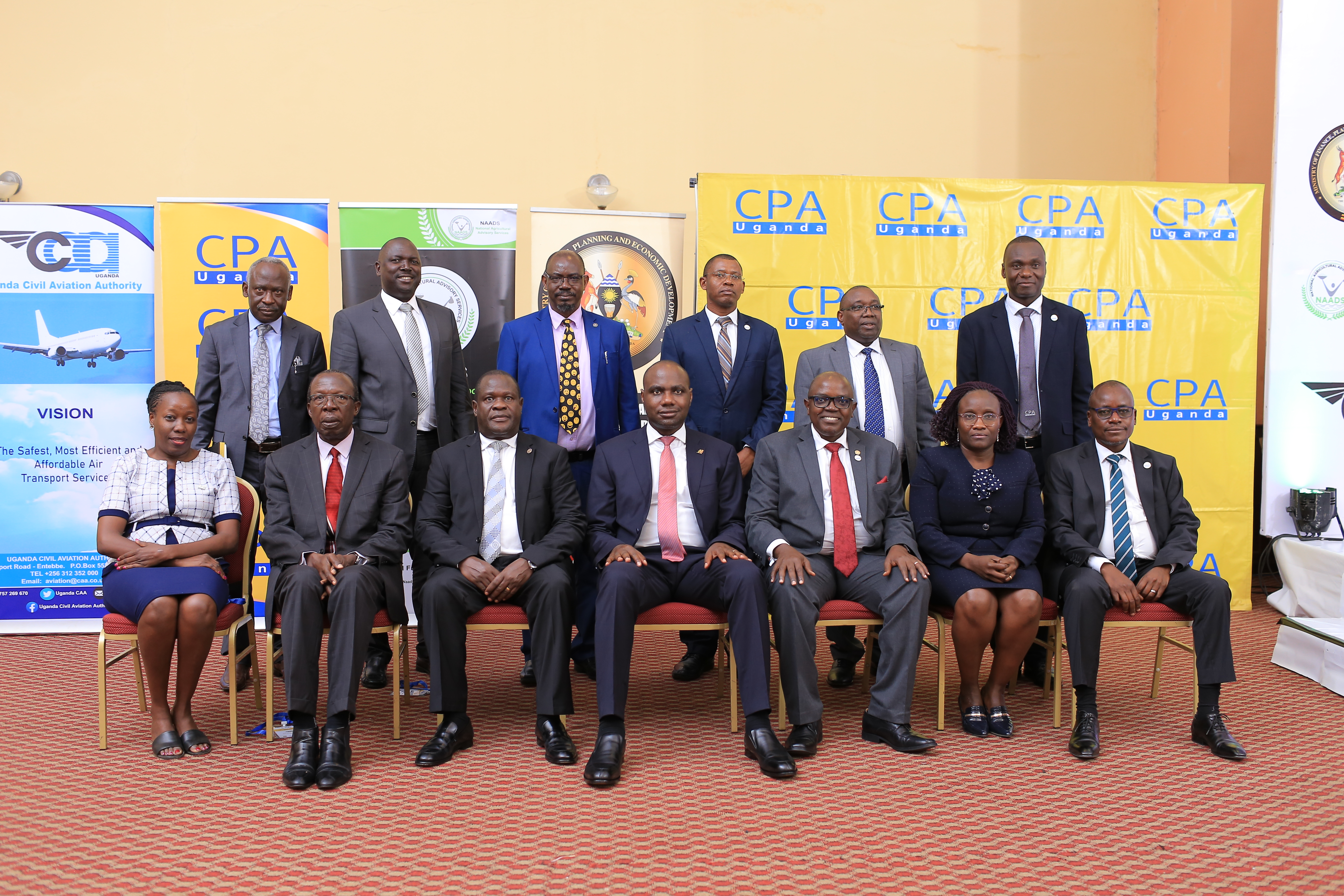 ICPAU Council Members, Hon. Henry Musasizi, CPA Dr. Fixon Okonye and CPA Lawrence Semakula pose for a photo