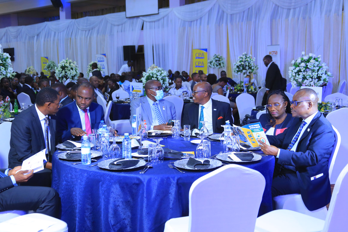 Some ICPAU Council members with the Chief Guest, Hon. Henry Musasizi (3rd Left).