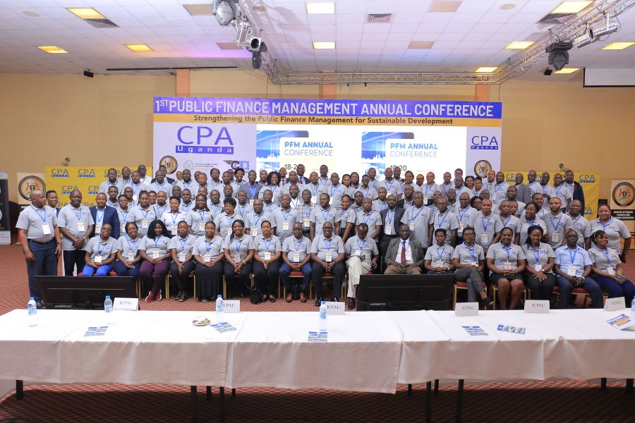 Participants smile for a group picture