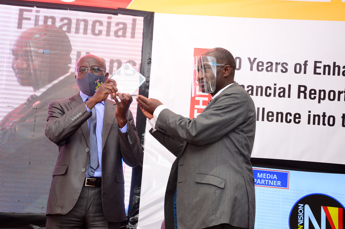 Makerere Retirement Benefits Scheme (MURBS) won in the Retirement Benefit Schemes category. Left is Dr. Godwin Kakuba, the Chairperson Board of Trustees & Right is CPA Gervase Ndyanabo