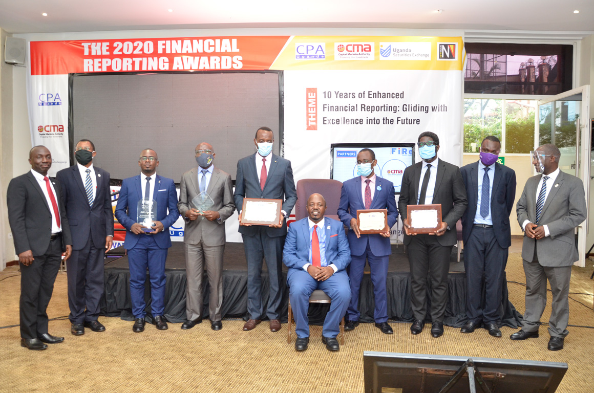 Some of the 2020 Financial Reporting Awards winners with Officials from ICPAU, CMA and Vision Group
