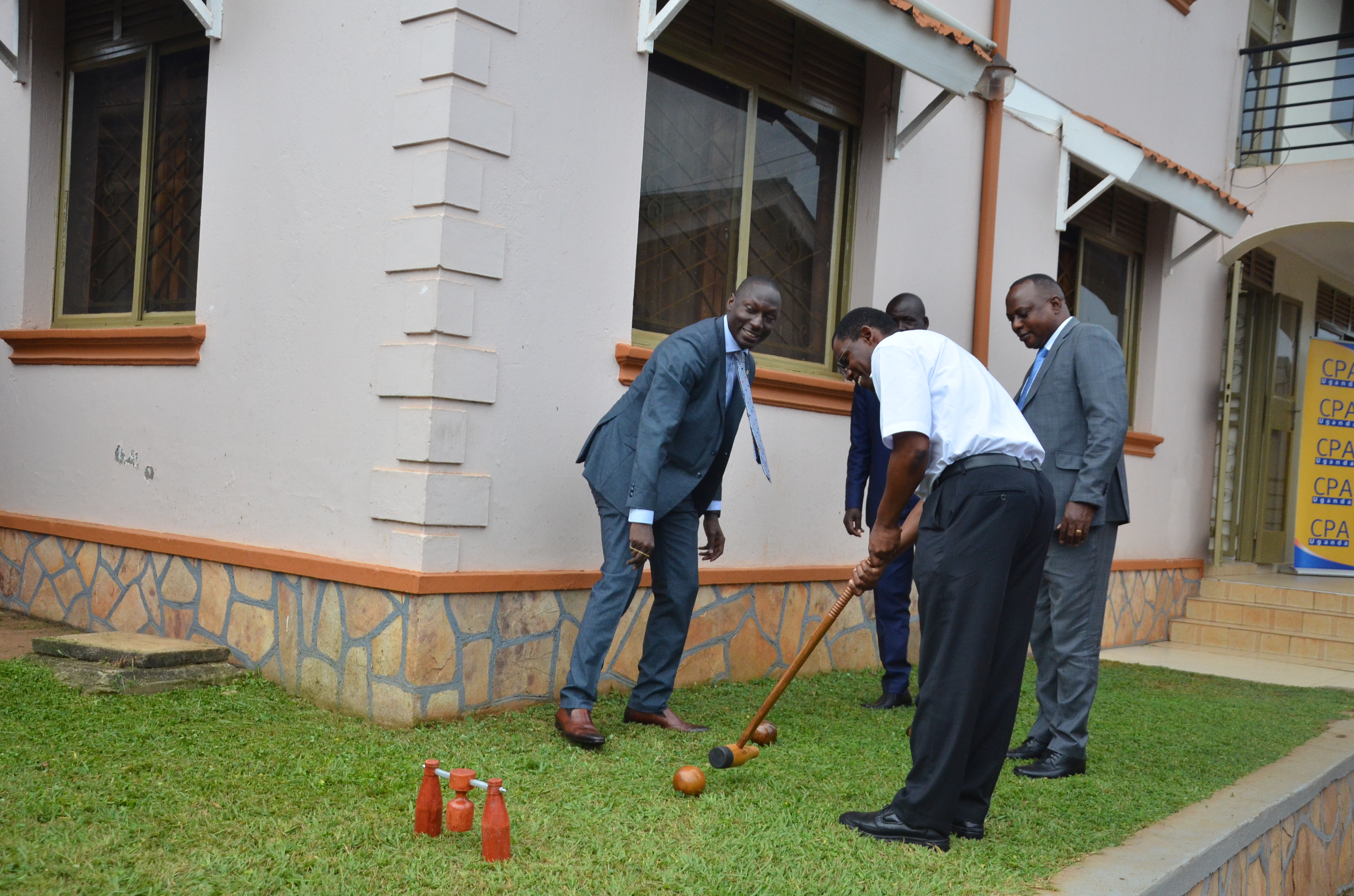 The CEO showing his skill at the Woodball game