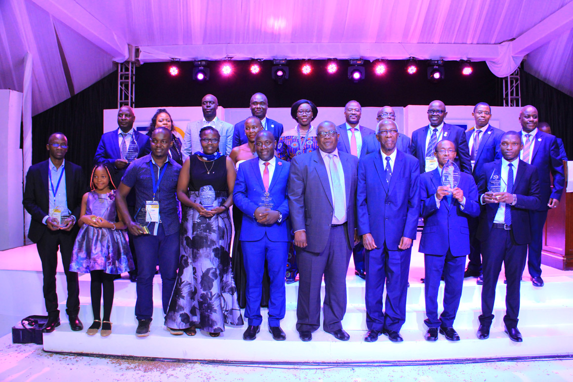 Winners of the 2022 Accountancy Service Awards with ICPAU officials and the Chief Guest of the event, Dr Asa Mugenyi the Chairperson of the Tax Appeals Tribunal (4th Right standing).