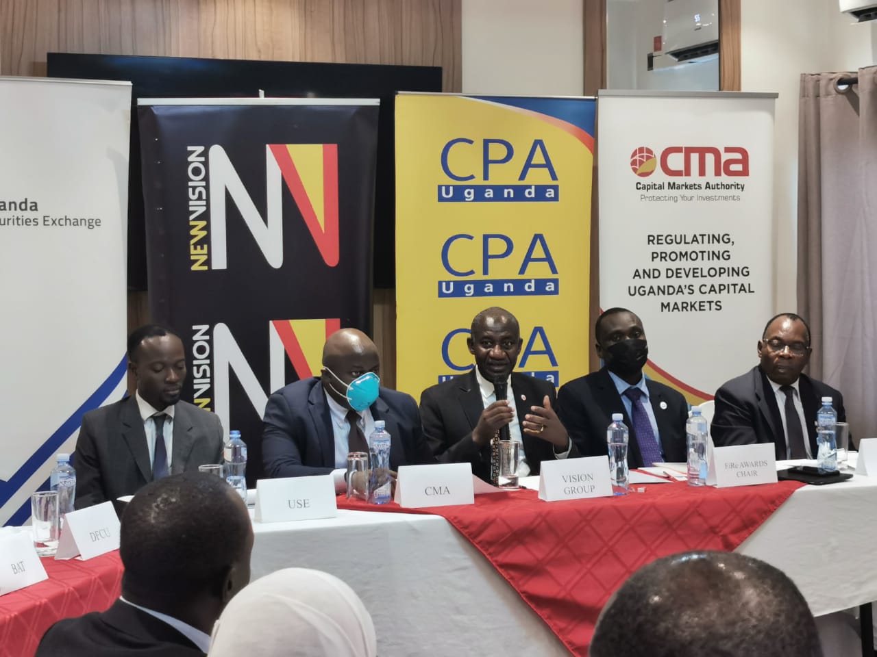 L-R: Mr Andrew Mwima - Trading and Research Manager at USE, Mr Ssembuya Dickson - Director of Research and Market Development at CMA, CPA Gervase Ndyanabo -Deputy Managing Director of Vision Group, CPA Stephen Ineget - Chairman of the Financial Reporting Awards Committee and Mr John Ntangaare, Director – Education at ICPAU